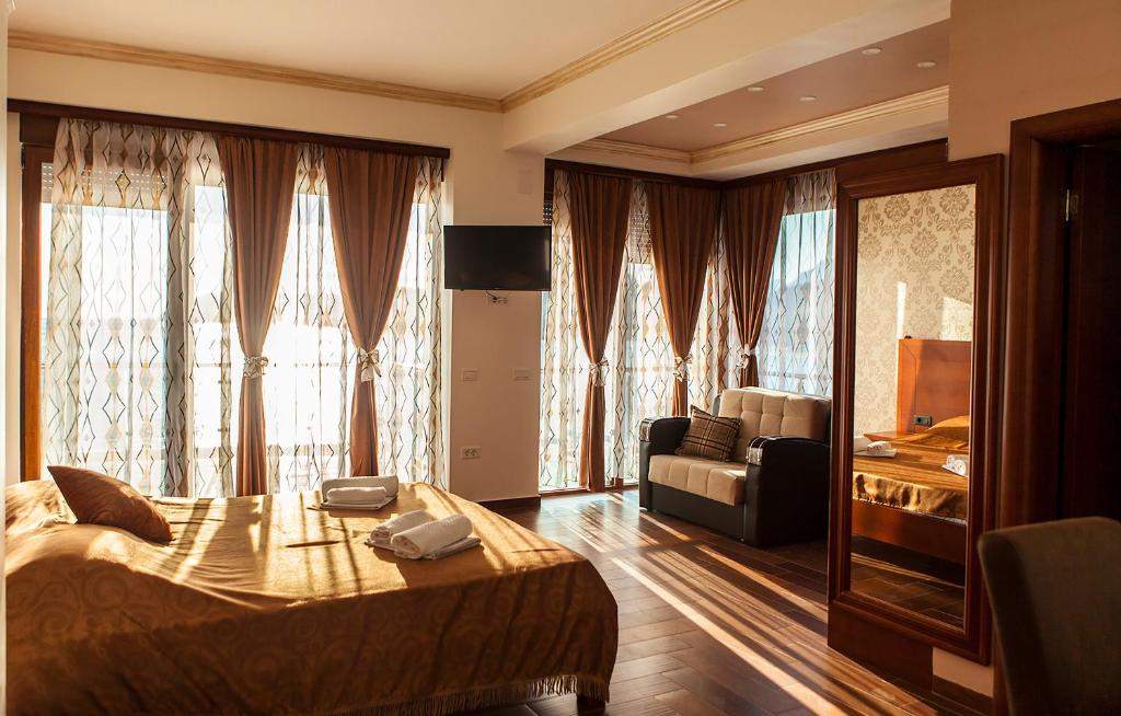 Spacious room with terrace doors and seating area